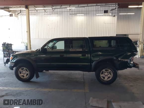 2002 Toyota Tacoma with VIN 5TEHN72N12Z093703, listed as a IAAI auction lot 43227138 with 278,842 mi miles and . Bid and sale history available at DreamBid. Image 14.