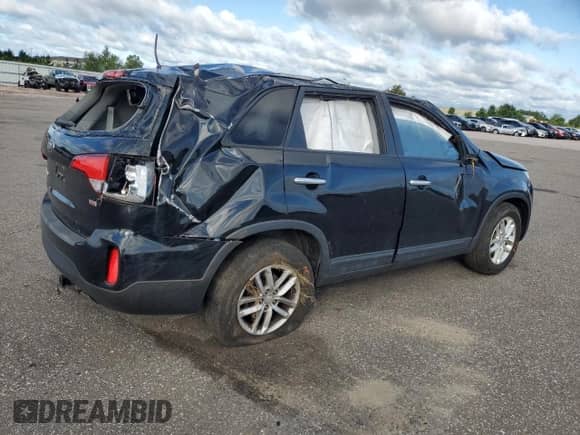 2014 Kia Sorento LX with VIN 5XYKT4A69EG435403, listed as a Copart auction lot 71634595 with Not provided miles and Salvage title. Bid and sale history available at DreamBid. Image 3.