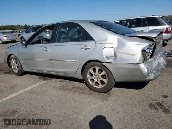 2005 Toyota Camry XLE with VIN 4T1BF30K05U595874, listed as a Copart auction lot 84923435 with 194,695 mi miles and Salvage title. Bid and sale history available at DreamBid. Image 2.