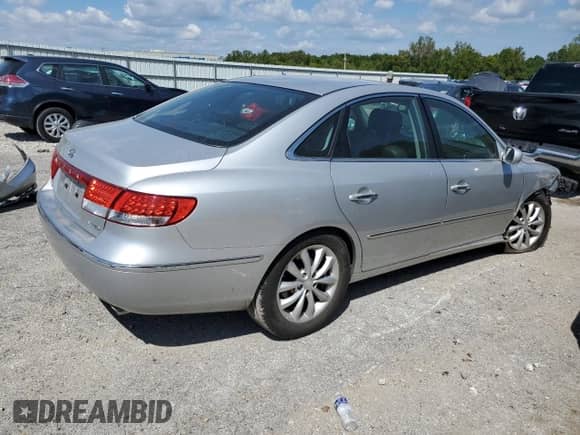 2006 Hyundai Azera SE с VIN KMHFC46F66A121649, выставлен на аукционе Copart как лот 71426215 с пробегом 173 484 миль миль и Списание • Salvage title. История ставок и продаж доступна на DreamBid. Изображение 3.