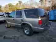 2000 Chevrolet Blazer LS z VIN 1GNCS13W6Y2365299, wystawiony jako Copart lot #41368365 z przebiegiem 144 294 mil mil oraz Szkoda całkowita • Salvage title. Historia ofert i sprzedaży dostępna na DreamBid. Obrazek 2.