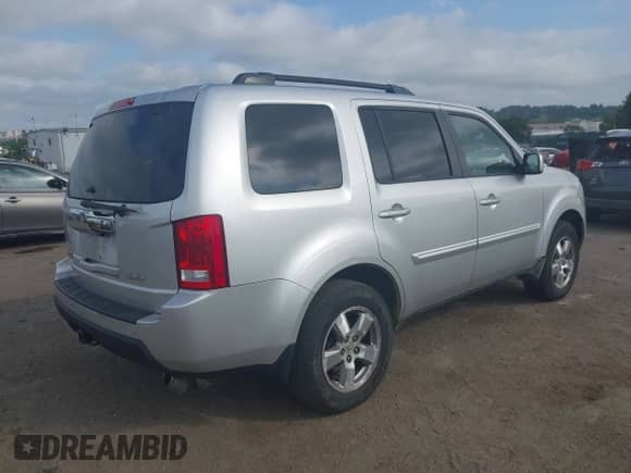 2009 Honda Pilot EX with VIN 5FNYF48429B044810, listed as a IAAI auction lot 42974224 with Not provided miles and . Bid and sale history available at DreamBid. Image 4.