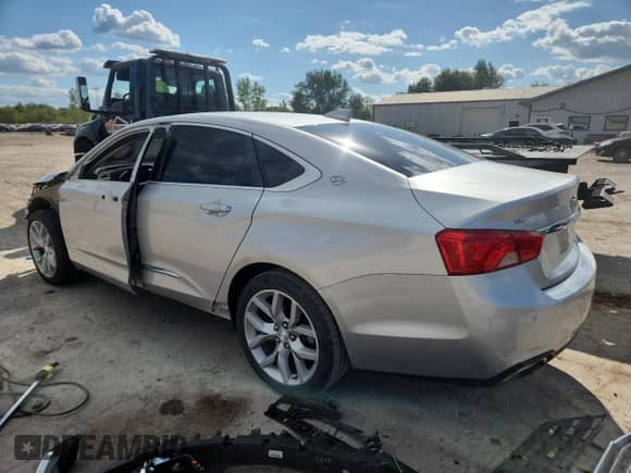 2017 Chevrolet Impala Premier with VIN 1G1145S39HU195218, listed as a Copart auction lot 70153135 with 103,083 mi miles and Salvage title. Bid and sale history available at DreamBid. Image 2.