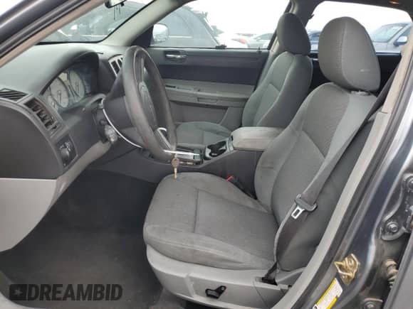 2006 Chrysler 300 with VIN 2C3KA43R26H212608, listed as a Copart auction lot 70172685 with 194,730 mi miles and Salvage title. Bid and sale history available at DreamBid. Image 7.