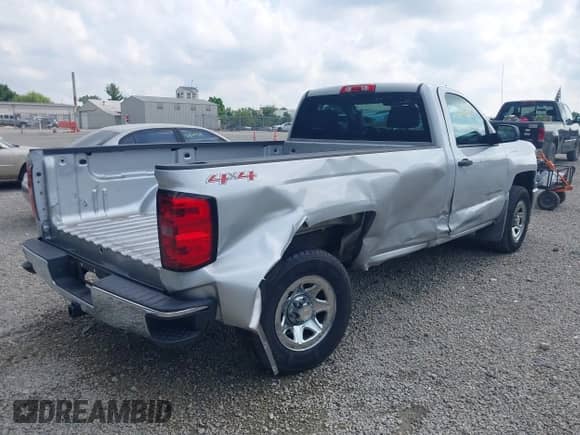 2014 Chevrolet Silverado 1500 Work Truck with VIN 1GCNKPEH2EZ145499, listed as a IAAI auction lot 42866948 with 107,961 mi miles and . Bid and sale history available at DreamBid. Image 4.