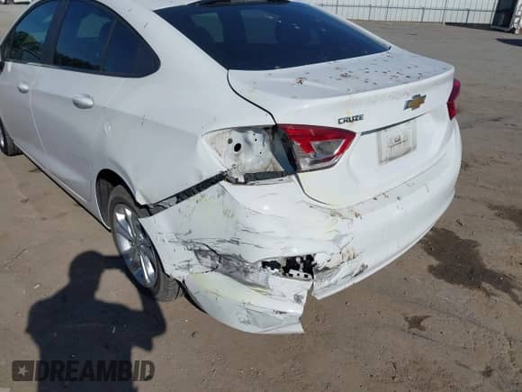 2019 Chevrolet Cruze LS with VIN 1G1BC5SM1K7101788, listed as a IAAI auction lot 43360258 with 97,871 mi miles and . Bid and sale history available at DreamBid. Image 6.