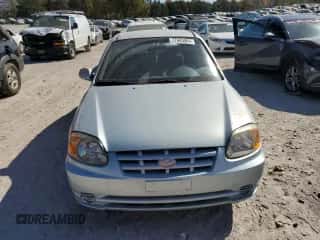 2005 Hyundai Accent GLS с VIN KMHCG35C55U325672, выставлен на аукционе Copart как лот 77685964 с пробегом 161 228 миль миль и Списание • Salvage title. История ставок и продаж доступна на DreamBid. Изображение 5.