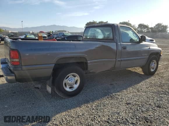 2002 Dodge RAM with VIN 3B7KC266X2M268979, listed as a Copart auction lot 81127784 with 132,579 mi miles and Salvage title. Bid and sale history available at DreamBid. Image 3.