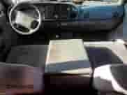 2000 Dodge 1500 z VIN 1B7HF13Z0YJ117908, wystawiony jako Copart lot #72387474 z przebiegiem 107 710 mil mil oraz Szkoda całkowita • Salvage title. Historia ofert i sprzedaży dostępna na DreamBid. Obrazek 8.