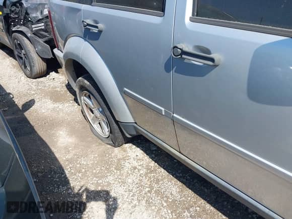 2007 Dodge Nitro SXT with VIN 1D8GU28K17W731307, listed as a IAAI auction lot 43160059 with 168,275 mi miles and . Bid and sale history available at DreamBid. Image 12.