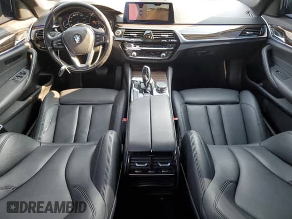 2019 BMW 5 Series 530e с VIN WBAJA9C54KB389016, выставлен на аукционе Copart как лот 67303865 с пробегом 82 963 миль миль и Списание • Salvage title. История ставок и продаж доступна на DreamBid. Изображение 8.