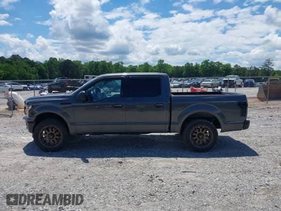 2018 Ford F-150 XL с VIN 1FTEW1CG1JKC57144, выставлен на аукционе IAAI как лот 42257016 с пробегом 87 001 миль миль и . История ставок и продаж доступна на DreamBid. Изображение 14.