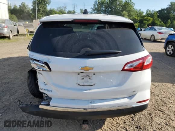 2020 Chevrolet Equinox LT с VIN 3GNAXKEV9LS694935, выставлен на аукционе Copart как лот 65792125 с пробегом 22 729 миль миль и Списание • Salvage title. История ставок и продаж доступна на DreamBid. Изображение 6.