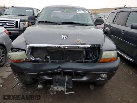 2003 Dodge Dakota Sport с VIN 1D7HG38N33S106425, выставлен на аукционе Copart как лот 89371695 с пробегом 159 449 миль миль и Списание • Salvage title. История ставок и продаж доступна на DreamBid. Изображение 5.