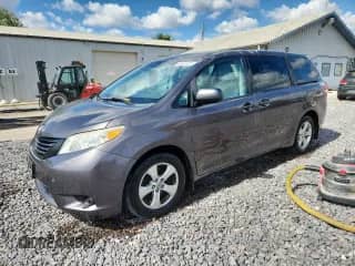 2012 Toyota Sienna with VIN 5TDZK3DCXCS233781, listed as a Copart auction lot 82167325 with 183,332 mi miles and Salvage title. Bid and sale history available at DreamBid. Image 1.