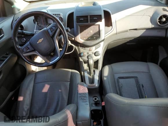 2013 Chevrolet Sonic LTZ с VIN 1G1JE5SH7D4226596, выставлен на аукционе Copart как лот 40272184 с пробегом 150 981 миль миль и Списание • Salvage title. История ставок и продаж доступна на DreamBid. Изображение 8.