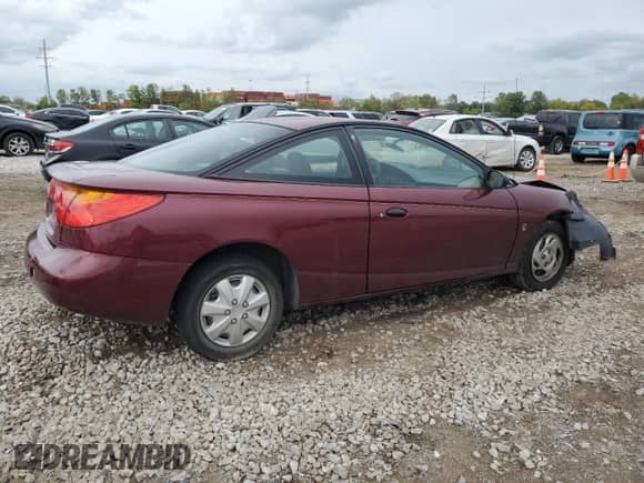 2002 Saturn SC с VIN 1G8ZP12892Z239888, выставлен на аукционе Copart как лот 72613284 с пробегом 130 138 миль миль и Списание • Salvage title. История ставок и продаж доступна на DreamBid. Изображение 3.