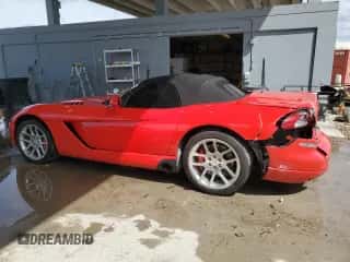 2004 Dodge Viper SRT-10 with VIN 1B3JZ65Z54V101307, listed as a Copart auction lot 83836345 with 20,119 mi miles and Salvage title. Bid and sale history available at DreamBid. Image 2.