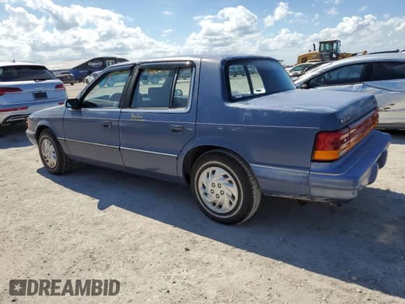1993 Dodge Spirit with VIN 1B3XA46K0PF638477, listed as a Copart auction lot 75710534 with 50,637 mi miles and Salvage title. Bid and sale history available at DreamBid. Image 2.