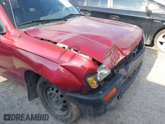 1995 Toyota Tacoma z VIN 4TAUN53B1SZ040515, wystawiony jako IAAI lot #43135152 z przebiegiem 259 900 mil mil oraz . Historia ofert i sprzedaży dostępna na DreamBid. Obrazek 12.