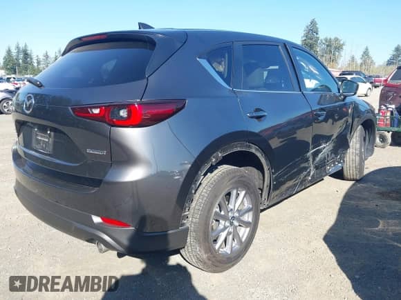 2023 Mazda CX-5 S Carbon Edition z VIN JM3KFBCM6P0143148, wystawiony jako IAAI lot #43382486 z przebiegiem 22 099 mil mil oraz . Historia ofert i sprzedaży dostępna na DreamBid. Obrazek 4.