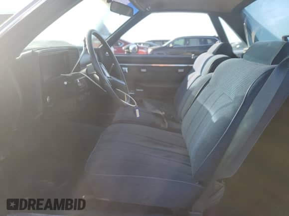 1985 Chevrolet El Camino с VIN 3GCCW80H0FS918901, выставлен на аукционе Copart как лот 77799744 с пробегом 64 541 миль миль и Списание • Salvage title. История ставок и продаж доступна на DreamBid. Изображение 7.