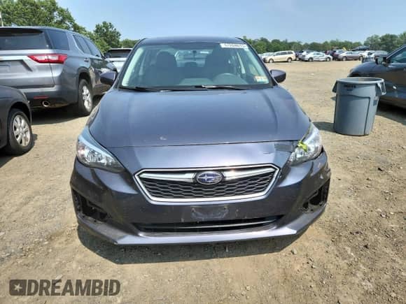 2017 Subaru Impreza Premium with VIN 4S3GKAB6XH3620168, listed as a Copart auction lot 67204615 with 146,300 mi miles and Salvage title. Bid and sale history available at DreamBid. Image 5.