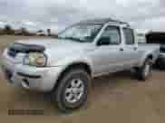 2003 Nissan Frontier SVE with VIN 1N6MD29Y83C457312, listed as a Copart auction lot 79390474 with 119,904 mi miles and Salvage title. Bid and sale history available at DreamBid. Image 1.