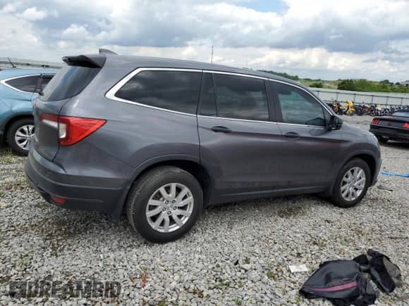 2019 Honda Pilot LX с VIN 5FNYF5H19KB028217, выставлен на аукционе Copart как лот 58665345 с пробегом Не указан миль и Списание • Salvage title. История ставок и продаж доступна на DreamBid. Изображение 3.