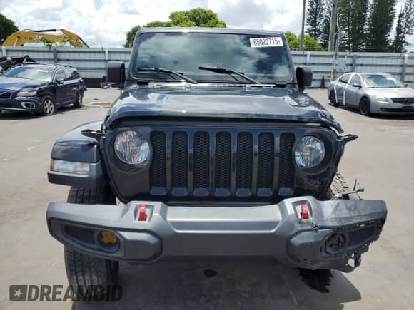 2021 Jeep Wrangler Unlimited Sport S z VIN 1C4HJXDG2MW816002, wystawiony jako Copart lot #65022715 z przebiegiem 60 542 mil mil oraz Szkoda całkowita • Salvage title. Historia ofert i sprzedaży dostępna na DreamBid. Obrazek 5.