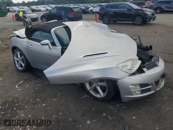 2009 Saturn Sky with VIN 1G8MN35B69Y104743, listed as a Copart auction lot 67203075 with Not provided miles and Salvage title. Bid and sale history available at DreamBid. Image 4.