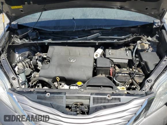 2015 Toyota Sienna XLE with VIN 5TDYK3DC9FS642659, listed as a Copart auction lot 70899615 with 147,363 mi miles and Salvage title. Bid and sale history available at DreamBid. Image 12.