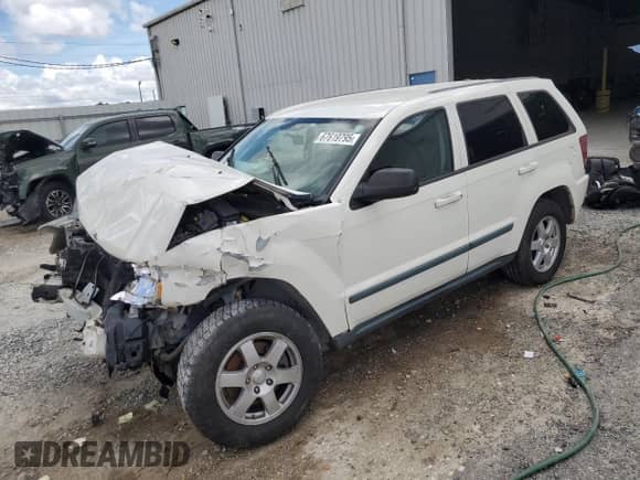 2008 Jeep Grand Cherokee Laredo с VIN 1J8GS48K98C244948, выставлен на аукционе Copart как лот 67619795 с пробегом Не указан миль и Списание • Salvage title. История ставок и продаж доступна на DreamBid. Изображение 1.