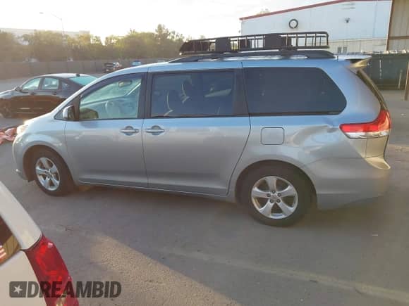 2014 Toyota Sienna LE AAS with VIN 5TDKK3DC0ES457615, listed as a IAAI auction lot 43502655 with 146,897 mi miles and . Bid and sale history available at DreamBid. Image 14.