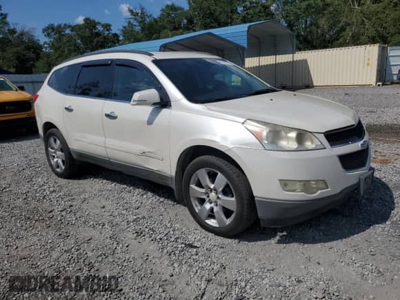 2012 Chevrolet Traverse 1LT with VIN 1GNKRGED3CJ327839, listed as a Copart auction lot 81422275 with 211,432 mi miles and Salvage title. Bid and sale history available at DreamBid. Image 4.