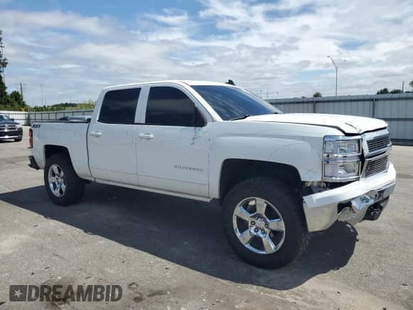 2015 Chevrolet Silverado 1500 LT с VIN 3GCUKRECXFG465019, выставлен на аукционе Copart как лот 80157265 с пробегом 129 761 миль миль и Списание • Salvage title. История ставок и продаж доступна на DreamBid. Изображение 4.
