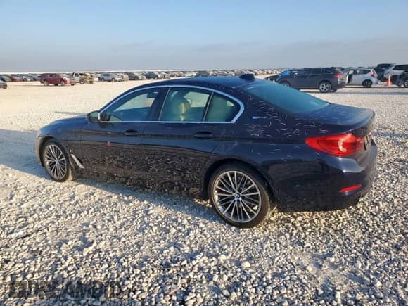 2019 BMW 5 Series 530e with VIN WBAJA9C51KB391757, listed as a Copart auction lot 68976115 with 64,597 mi miles and Clean title. Bid and sale history available at DreamBid. Image 2.