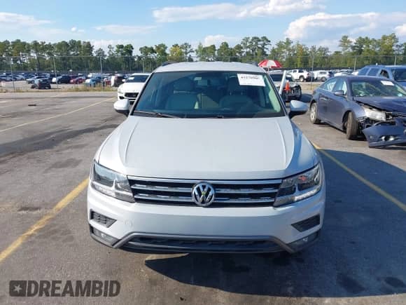 2018 Volkswagen Tiguan S с VIN 3VV1B7AX2JM026408, выставлен на аукционе IAAI как лот 43270909 с пробегом 176 896 миль миль и . История ставок и продаж доступна на DreamBid. Изображение 6.