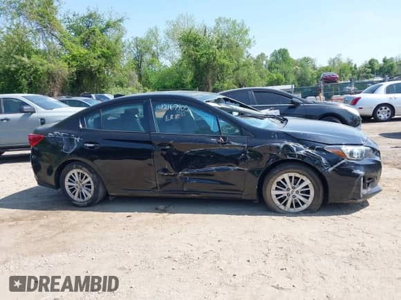 2017 Subaru Impreza Premium with VIN 4S3GKAB68H3606060, listed as a IAAI auction lot 42167905 with 77,802 mi miles and . Bid and sale history available at DreamBid. Image 14.