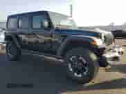 2025 Jeep Wrangler Rubicon with VIN 1C4RJXR65SW580303, listed as a Copart auction lot 90055045 with 13,415 mi miles and Clean title. Bid and sale history available at DreamBid. Image 4.