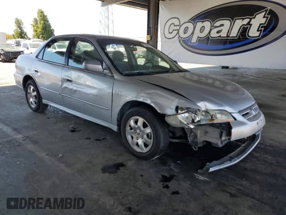 2002 Honda Accord EX с VIN 1HGCG56642A094478, выставлен на аукционе Copart как лот 70194195 с пробегом 208 583 миль миль и Списание • Salvage title. История ставок и продаж доступна на DreamBid. Изображение 4.