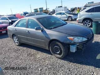 2004 Toyota Camry LE with VIN 4T1BE30K84U795211, listed as a IAAI auction lot 43341888 with 241,915 mi miles and . Bid and sale history available at DreamBid. Image 1.