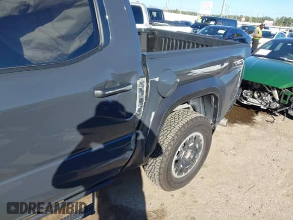 2024 Toyota Tacoma SR5 with VIN 3TYLB5JN0RT029530, listed as a IAAI auction lot 41213742 with 5,370 mi miles and . Bid and sale history available at DreamBid. Image 6.