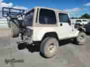 1999 Jeep Wrangler Sahara с VIN 1J4FY49S4XP411704, выставлен на аукционе Copart как лот 71826235 с пробегом Не указан миль и Списание • Salvage title. История ставок и продаж доступна на DreamBid. Изображение 3.