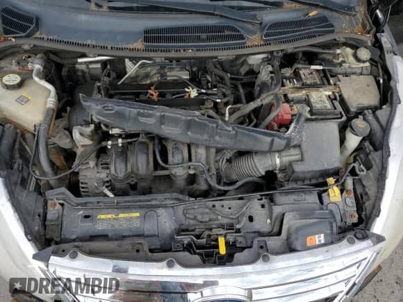 2011 Ford Fiesta SE z VIN 3FADP4BJ0BM166213, wystawiony jako Copart lot #80548175 z przebiegiem 156 861 mil mil oraz Szkoda całkowita • Salvage title. Historia ofert i sprzedaży dostępna na DreamBid. Obrazek 11.
