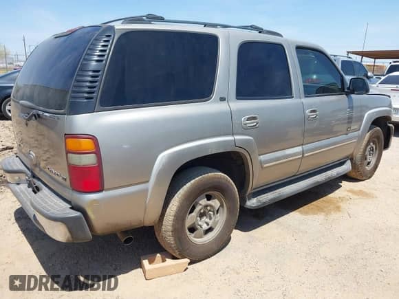2001 Chevrolet Tahoe LT z VIN 1GNEK13T71R212636, wystawiony jako IAAI lot #42398730 z przebiegiem Nie podano mil oraz . Historia ofert i sprzedaży dostępna na DreamBid. Obrazek 4.