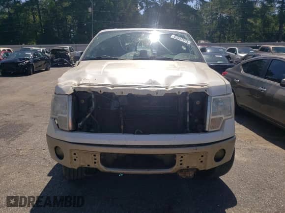 2013 Ford F-150 XLT с VIN 1FTFW1E62DFC09982, выставлен на аукционе Copart как лот 65897575 с пробегом 244 091 миль миль и Списание • Salvage title. История ставок и продаж доступна на DreamBid. Изображение 5.