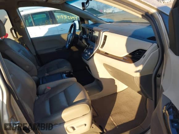 2016 Toyota Sienna XLE with VIN 5TDYK3DC8GS713481, listed as a IAAI auction lot 41239824 with 176,935 mi miles and . Bid and sale history available at DreamBid. Image 5.