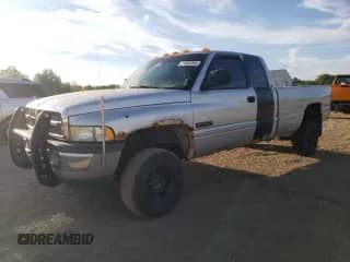 2002 Dodge 2500 with VIN 3B7KF23642M256418, listed as a Copart auction lot 71665395 with 94,189 mi miles and Salvage title. Bid and sale history available at DreamBid. Image 1.