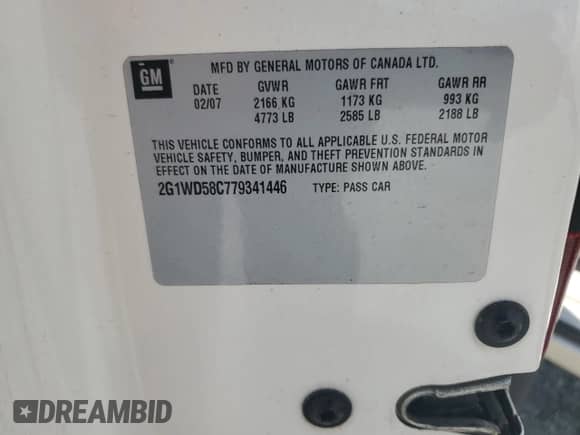 2007 Chevrolet Impala SS z VIN 2G1WD58C779341446, wystawiony jako Copart lot #69187775 z przebiegiem Nie podano mil oraz Szkoda całkowita • Salvage title. Historia ofert i sprzedaży dostępna na DreamBid. Obrazek 12.